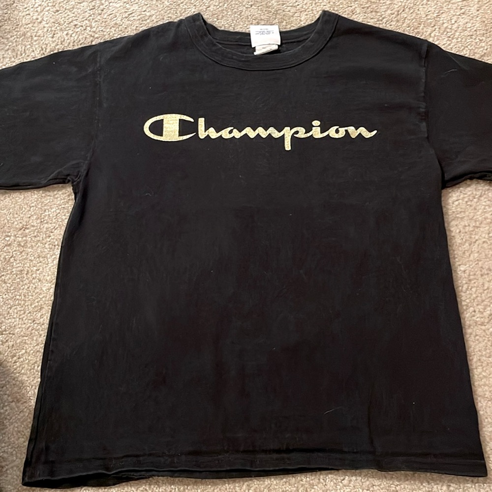 Men’s champion back with metallic gold writing t shirt. Small.